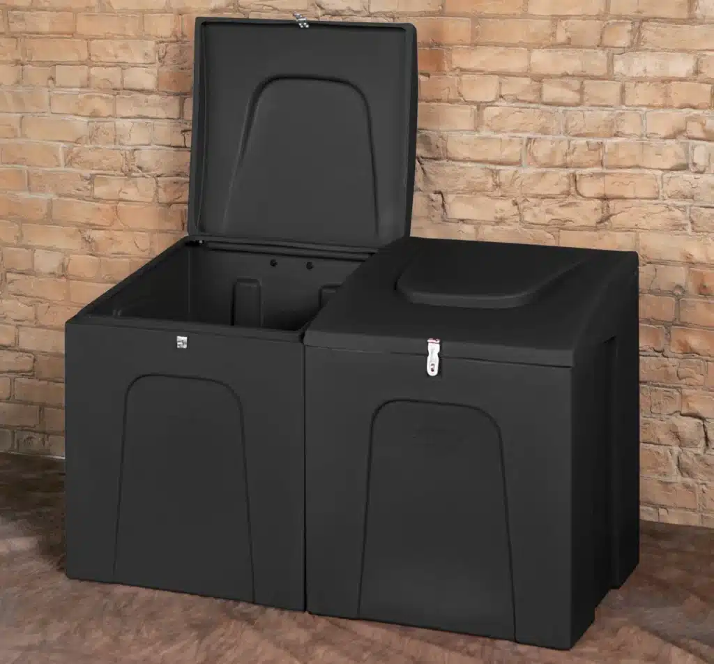 Two black storage bins with one of their lids open.