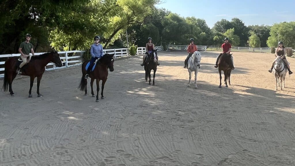 A group of horseback riders at Rocking J Stables.