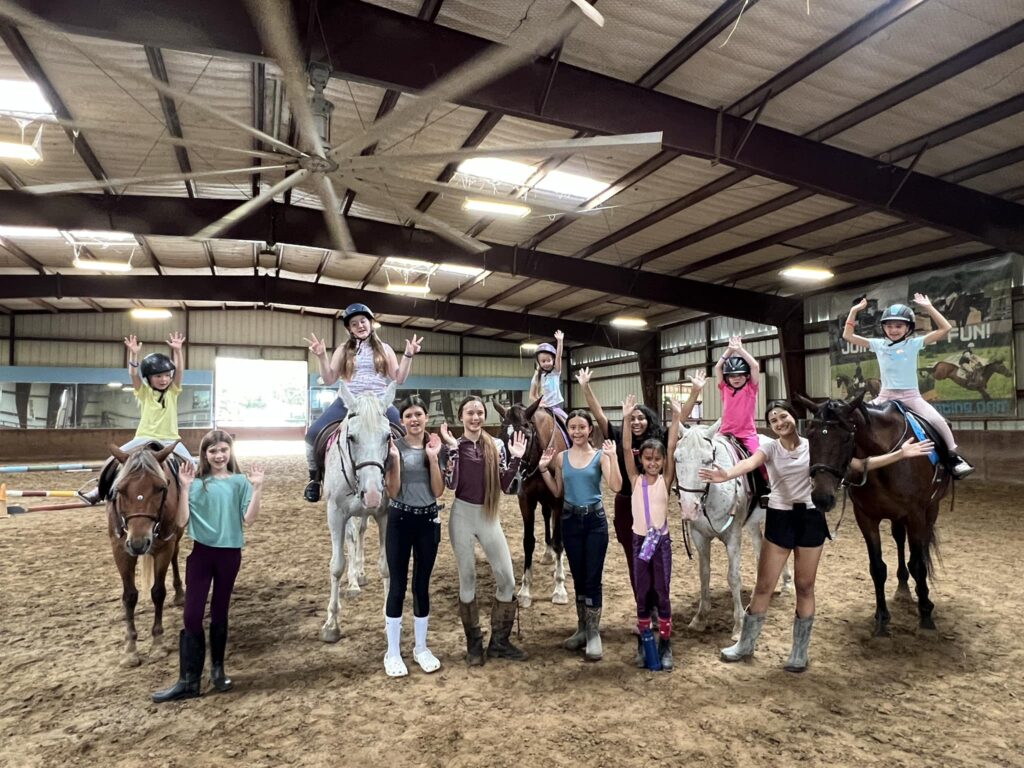 A group of horseback riders at Rockwall Hills Equestrian Center.
